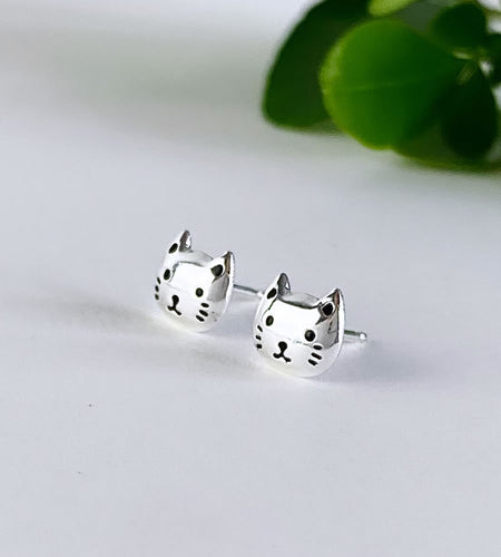 very cute sterling silver cat head studs for children