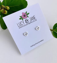Load image into Gallery viewer, sterling silver double heart studs on a white card