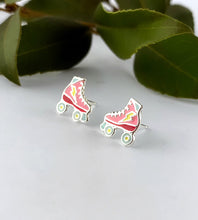 Load image into Gallery viewer, sterling silver colourful roller stake earrings - pink and red skates with little yellow lightning bolts on them.