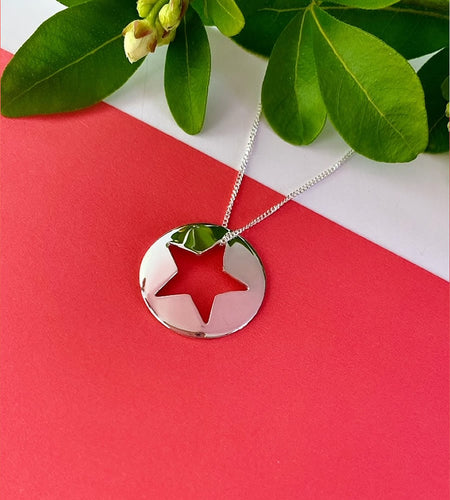 sterling silver high shine star cut out necklace