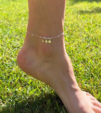 Load image into Gallery viewer, sterling silver anklet with three sterling silver star charms and silver beads on model's ankle