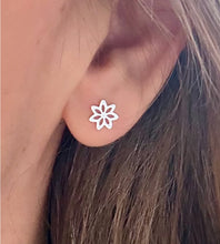 Load image into Gallery viewer, sterling silver lily flower earrings in model's ear