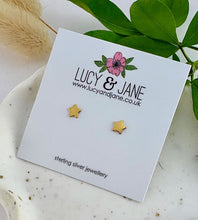 Load image into Gallery viewer, small gold star studs on a Lucy and Jane earring card
