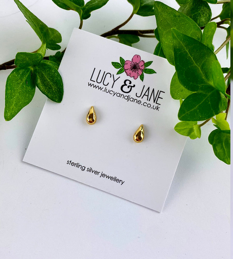 gold droplet studs on a backing card