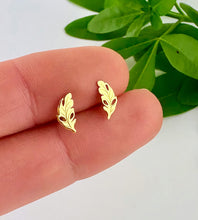 Load image into Gallery viewer, gold leaf stud earrings with etched design on them.