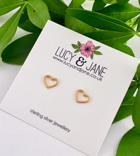 Load image into Gallery viewer, gold open heart studs on a Lucy and Jane earring card.