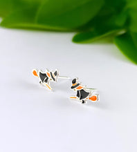 Load image into Gallery viewer, small sterling silver witch earrings on a tiny orange broom stick.