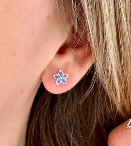 model wearing sterling silver sparkly purple flower earrings
