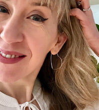 Load image into Gallery viewer, model wearing new sterling silver extra large heart hoops