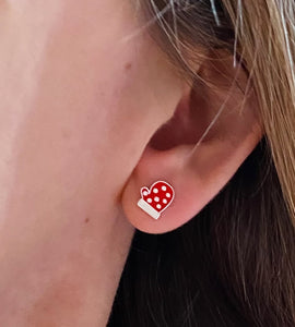 sterling silver christmas mitten gloves in model's ear
