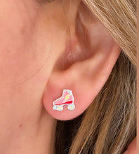 Load image into Gallery viewer, sterling silver pink roller skate studs in modell&#39;s ear
