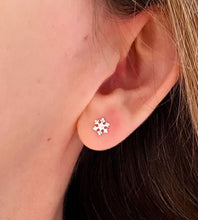 Load image into Gallery viewer, sterling silver snowflake studs in model&#39;s ear