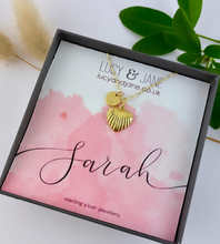 Load image into Gallery viewer, gold heart necklace in a necklace box with an initial charm and personalised hand lettered name card