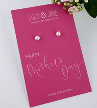 Load image into Gallery viewer, small freshwater pearl and sterling silver studs on a pink Happy Mother's Day card