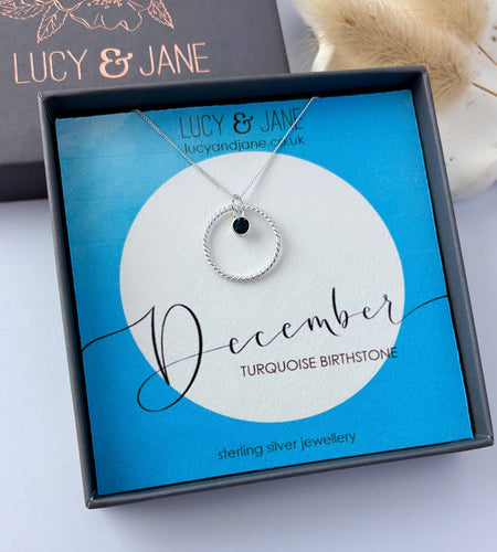 sterling silver circle birthstone necklace for December