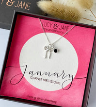 Load image into Gallery viewer, sterling silver bow birthstone necklace for January.  In a Lucy and Jane gift box