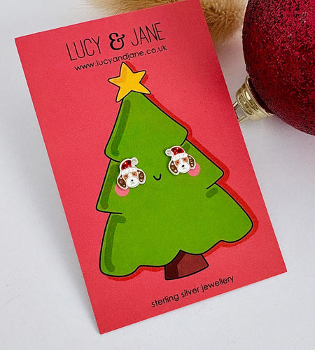 sterling silver festive dog earrings on a christmas card