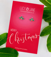Load image into Gallery viewer, Sterling silver holly studs on a Merry Christmas card