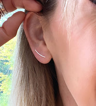 Load image into Gallery viewer, photo of someone wearing the sterling silver curved bar earring