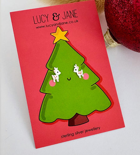 sterling silver cute small reindeer stud earrings on a Christmas card