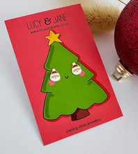 Load image into Gallery viewer, sterling silver santa head earrings on a christmas tree card
