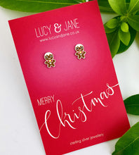 Load image into Gallery viewer, sterling silver gingerbread men studs on a festive card