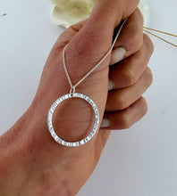 Load image into Gallery viewer, sterling silver hammered circle pendant on a sterling silver chain.   Circle is hammered to catch the light
