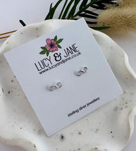 Load image into Gallery viewer, sterling silver inifinty stud earrings on a Lucy and Jane backing card