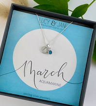Load image into Gallery viewer, sterling silver initial birthstone necklace for March with an aquamarine blue birthstone