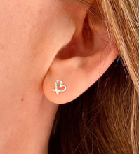 Load image into Gallery viewer, sterling silver knot heart studs on model