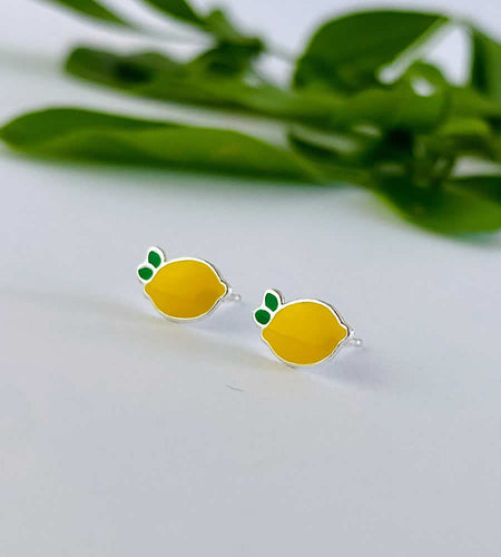sterling silver lemon stud earrings. Yellow lemon earrings with little green leaves