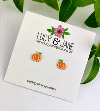 Load image into Gallery viewer, sterling silver pumpkin earrings on a backing card