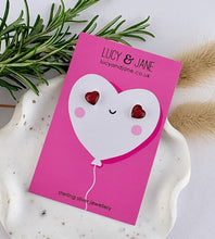 Load image into Gallery viewer, sterling silver red glitter heart studs on a valentine backing card