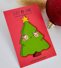 Load image into Gallery viewer, sterling silver reindeer head studs with a sparkly red nose on a Christmas card