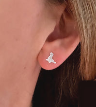 Load image into Gallery viewer, sterling silver seal ear studs in a model's ear