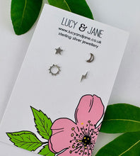 Load image into Gallery viewer, set of four sterling silver mismatched studs on a lucy and jane earring card