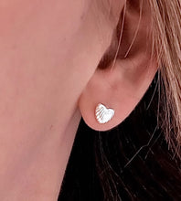 Load image into Gallery viewer, sterling silver shell heart earrings in a woman&#39;s ear