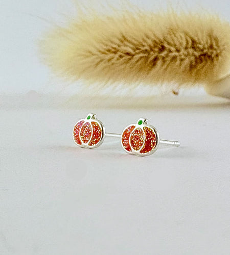 sterling silver mini pumpkin earrings.  orange with a little green stem and glitter