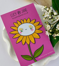Load image into Gallery viewer, sterling silver yellow flower earrings for children on a sunflower backing card