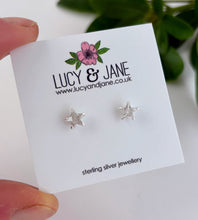 Load image into Gallery viewer, sterling silver sparkle star stud earrings on a lucy and jane earring card