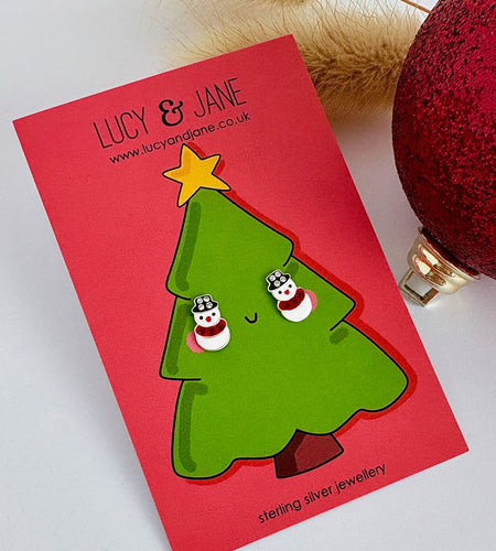 sterling silver sparkly snowman studs on a christmas tree backing card
