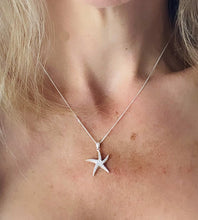 Load image into Gallery viewer, sterling silver starfish neckalce on model
