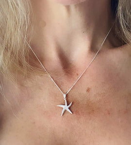 sterling silver starfish neckalce on model