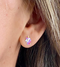 Load image into Gallery viewer, sterling silver unicorn earrings for children in a model&#39;s ear
