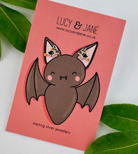 Load image into Gallery viewer, sterling silver witch studs on a Halloween themed Lucy and Jane backing card