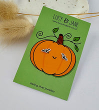 Load image into Gallery viewer, sterling silver black bat studs on a Halloween card