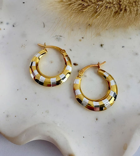 beautiful sterling silver and gold two tone hoops.
