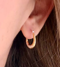 Load image into Gallery viewer, sterling silver and gold two tone hoops in model's ear.  Good everyday medium sized hoop that's approx 20mm