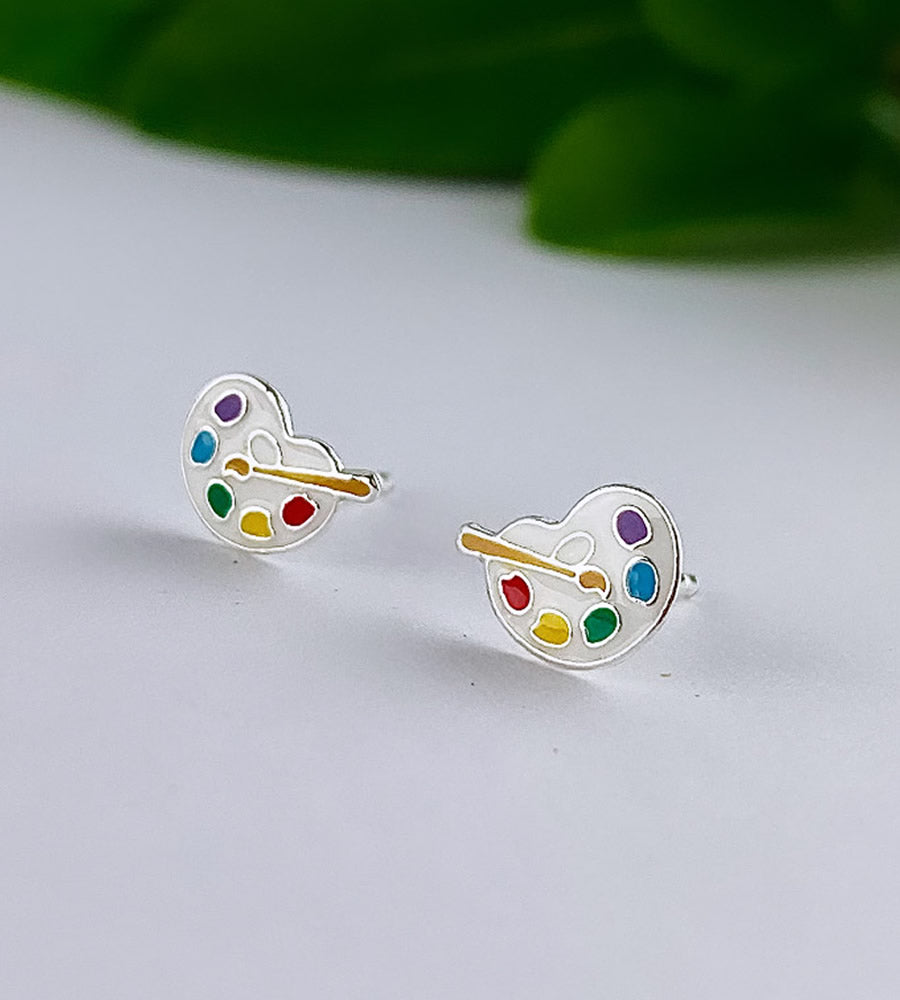 sterling sivler artist pallette tiny ear studs.  Colourful dots of paint and a little paintbrush on the tiny studs.