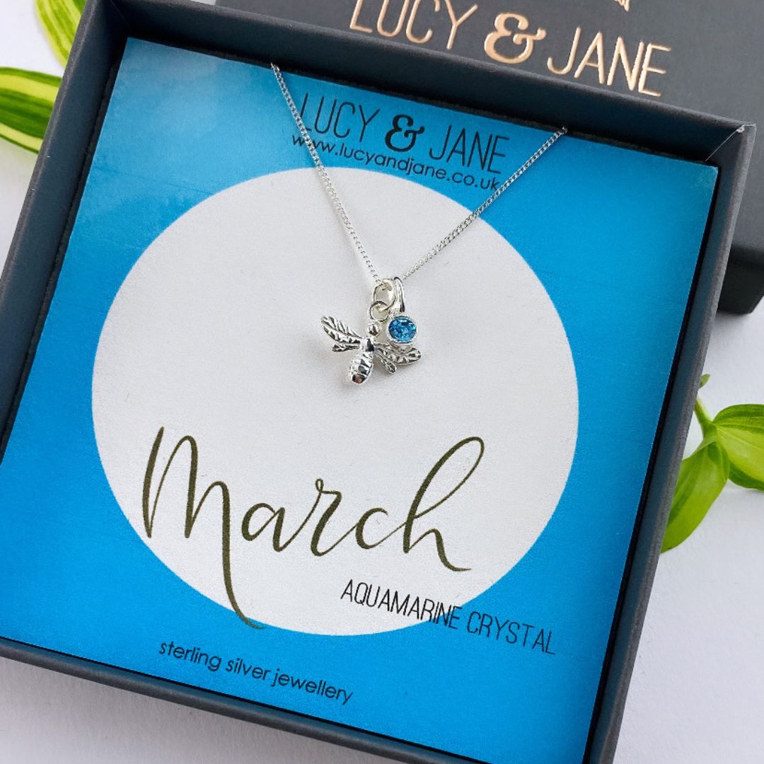 sterling silver bee birthstone necklace for march with an aquamarine crystal